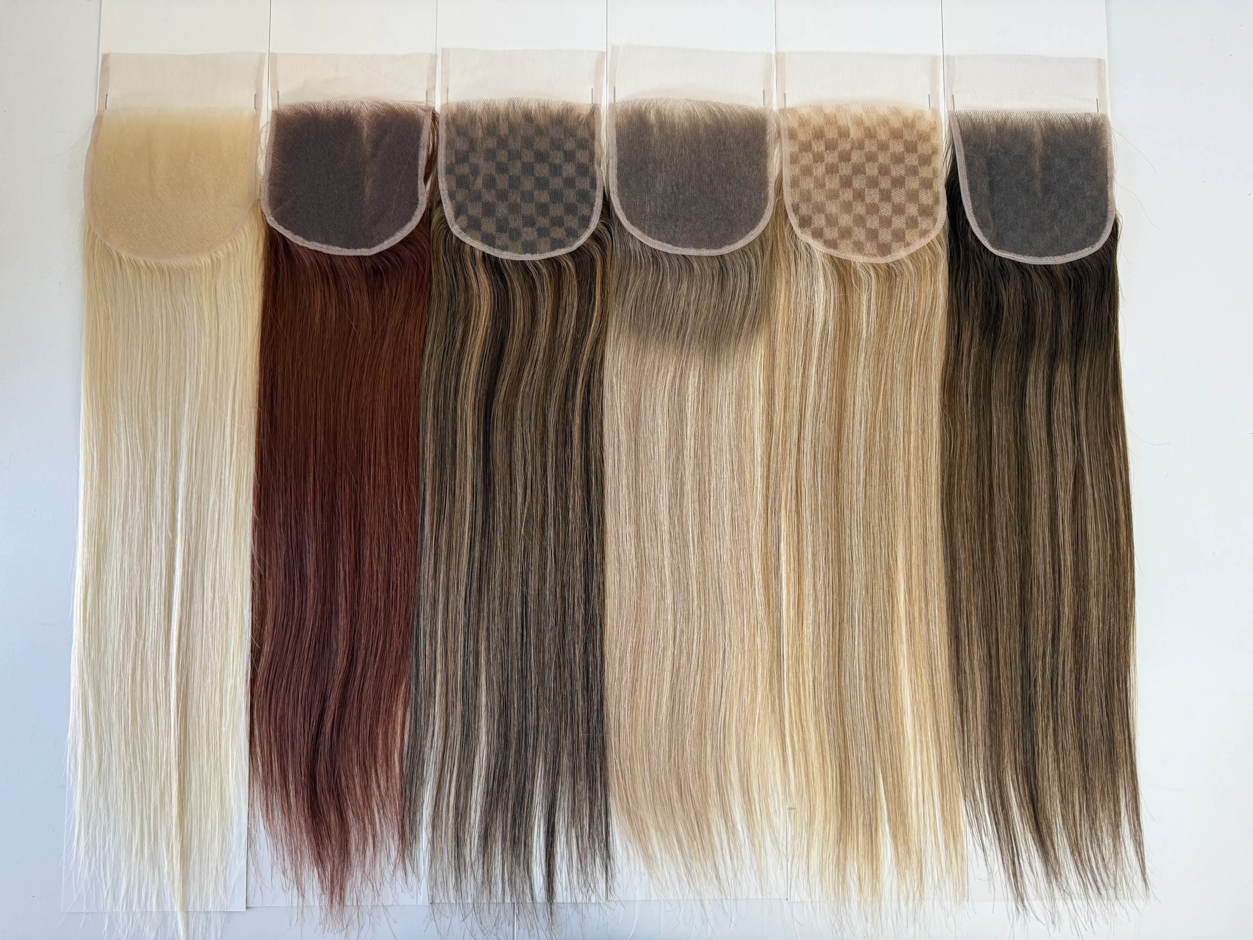 Lace closures in blonde and brown shades showing the bases