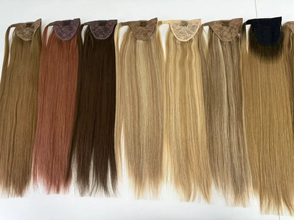 Ponytail hair pieces showing attachment bases and shade options
